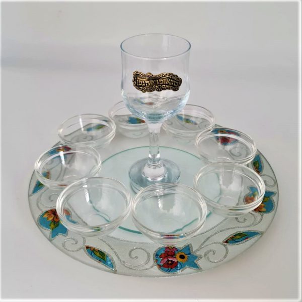 A plate for Rosh Hashana revolving glass + 8 saucers and a cup ...