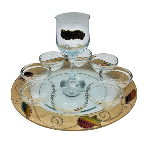 A plate for Rosh Hashana revolving glass + 8 saucers and a cup ...